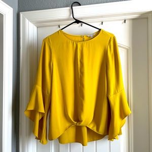 Yellow/mustard-colored blouse
